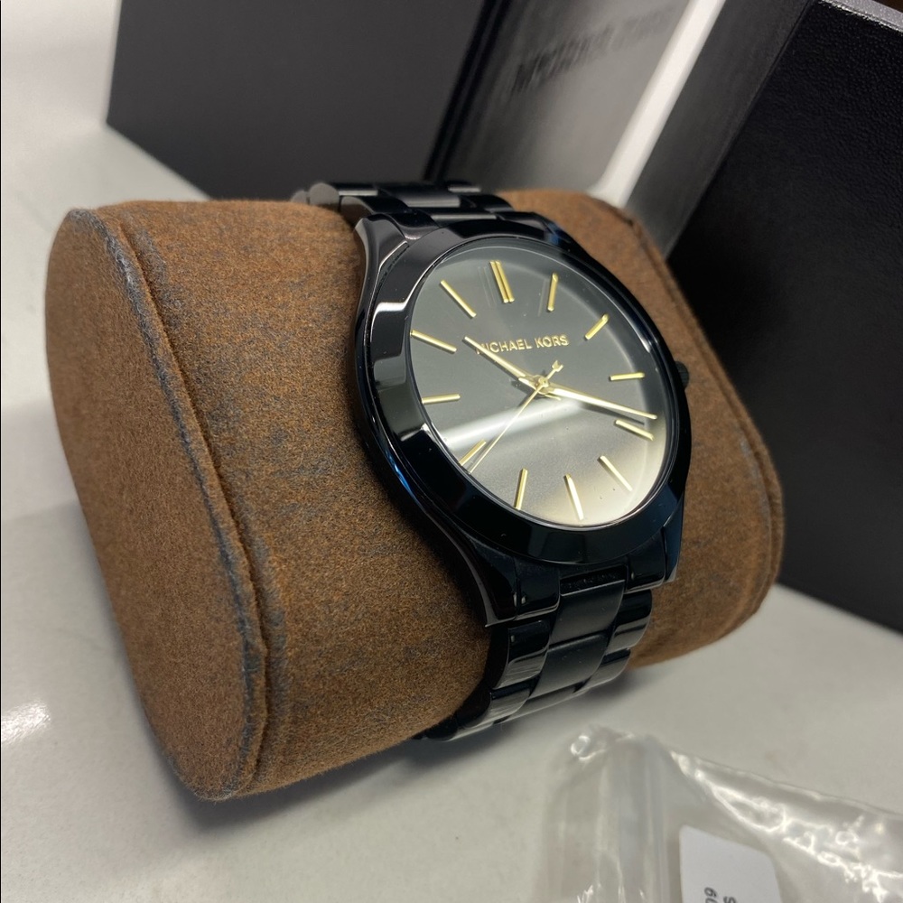 Men’s Michael Kors watch.
